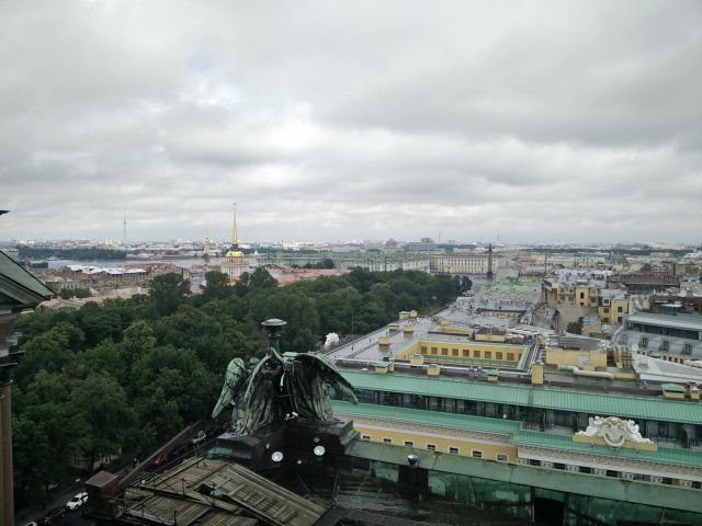 View from St Isaac's, looking directly towards the Winter Palace (the mint-green building in the centre); the gold spire is the Admiralty building, with Petropavlovskaya fortress behind it.
